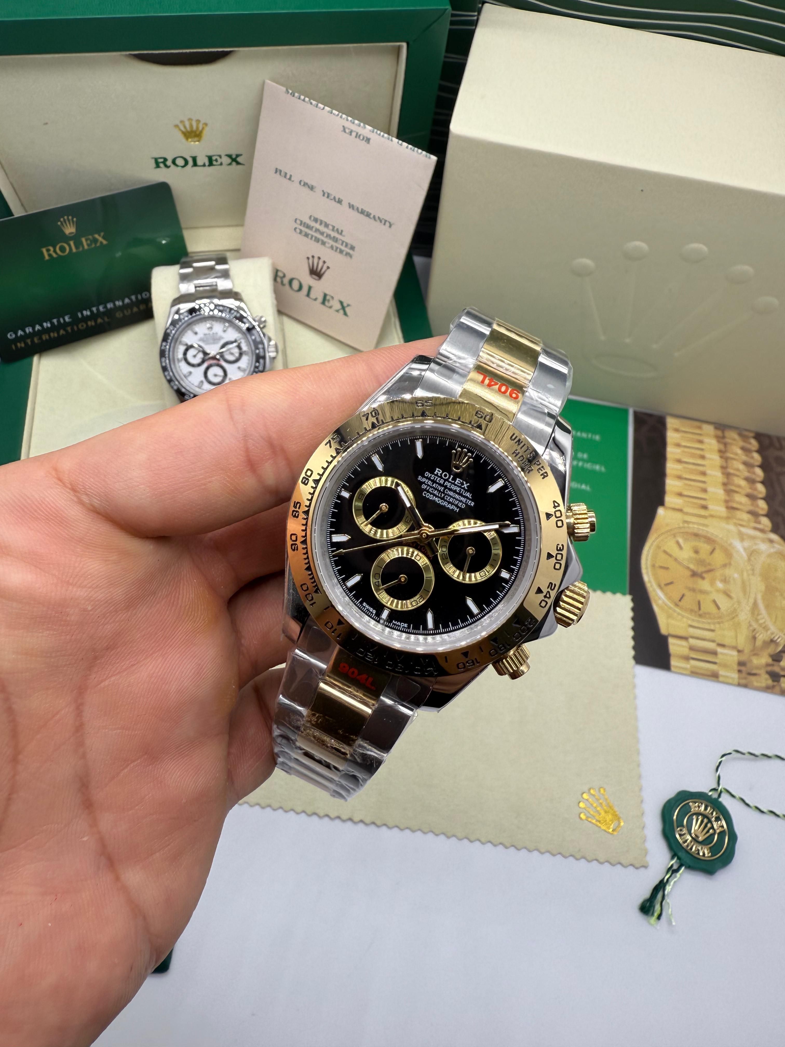Rolex Daytona Black and Gold — Rolex
