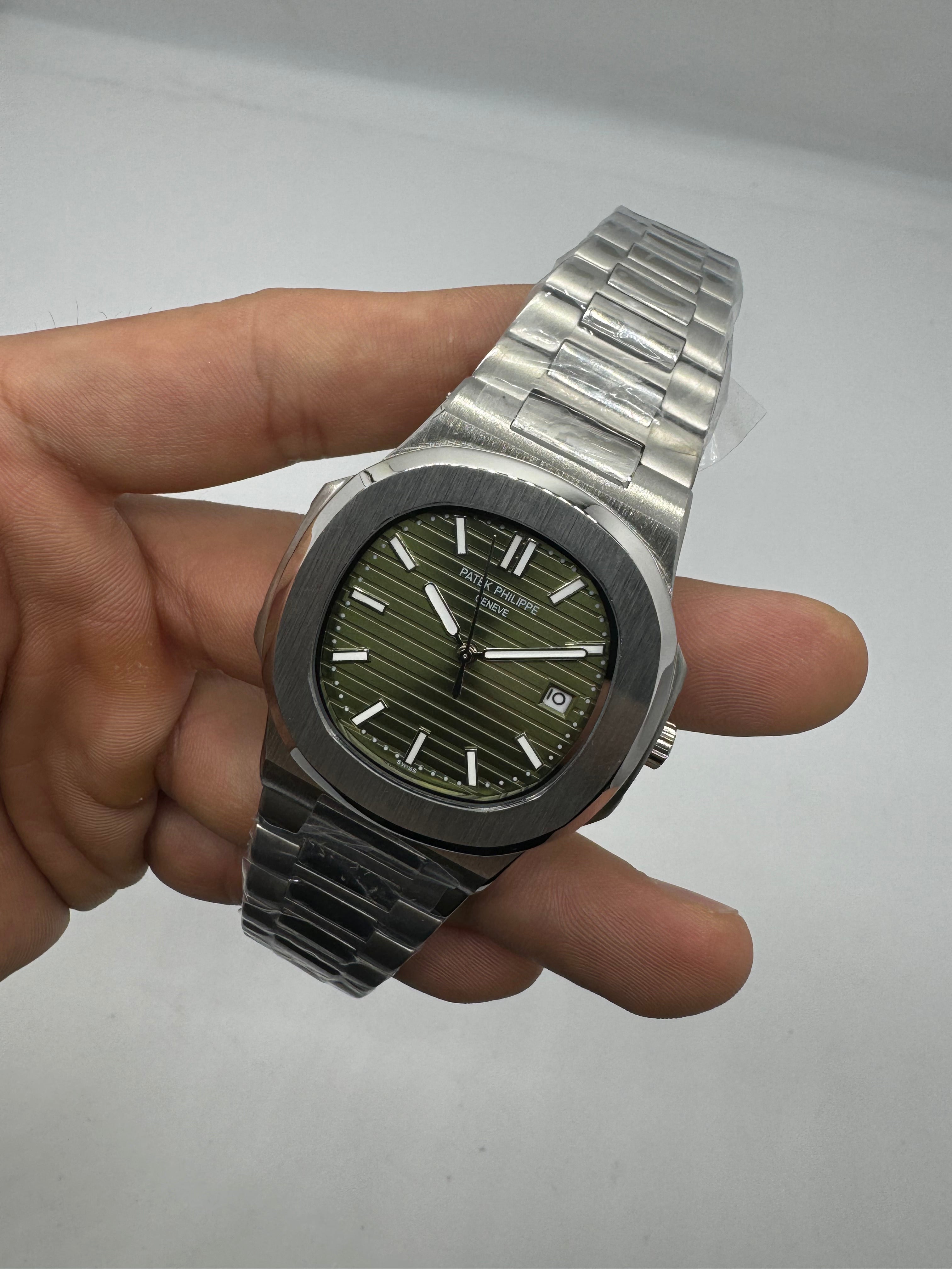 Patek Philippe Nautilus Olive Green Sunburst Dial — Patek Philippe